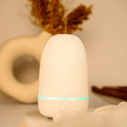 Difusor ultrasónico mini para aceites esenciales con iluminación LED